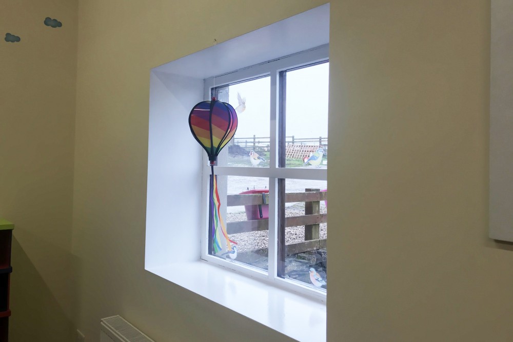 Hot air balloon lantern in the window